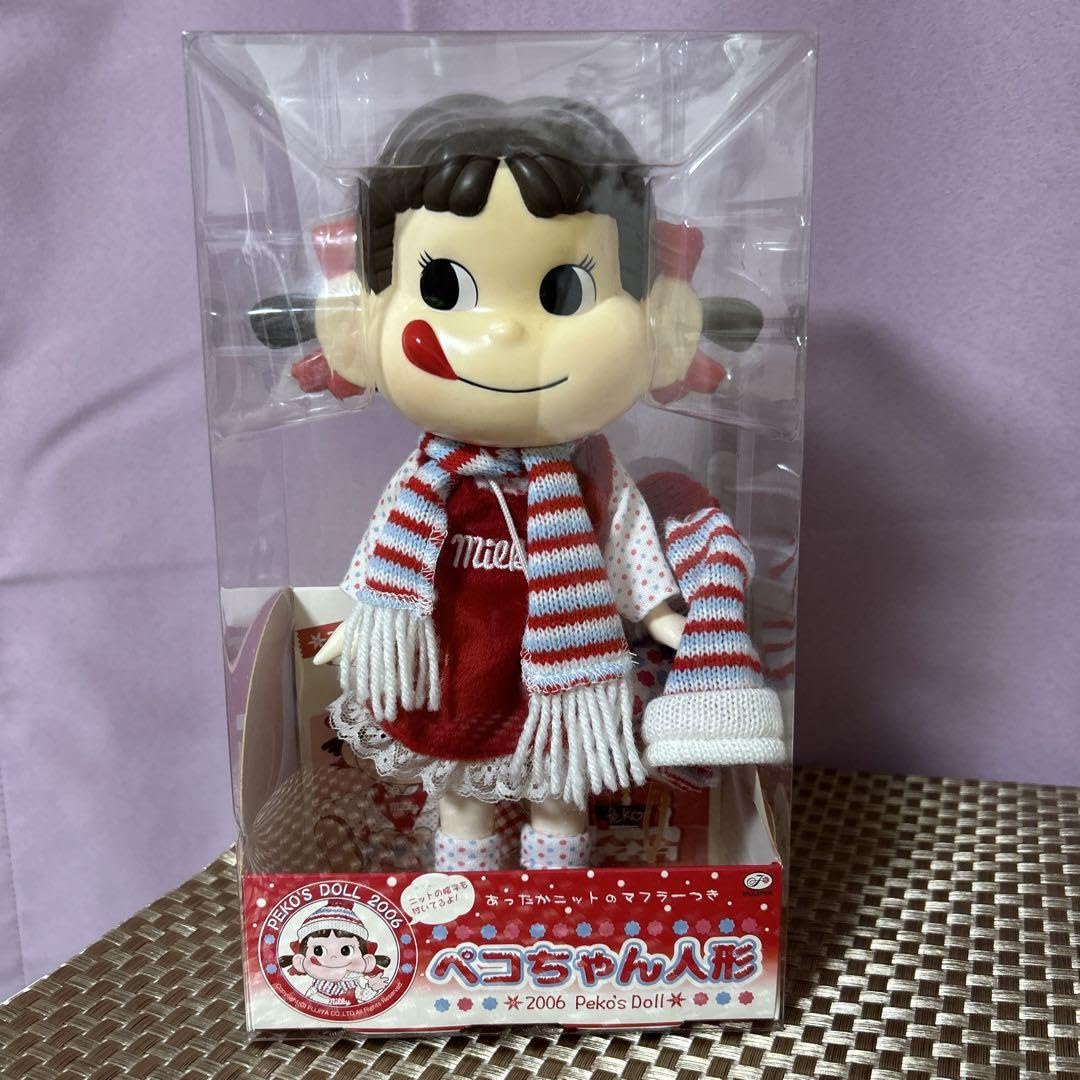 不二家ぺこちゃん人形 Amazon | 不二家 ペコちゃん人形 ミルキー65周年 セブンイレブン限定